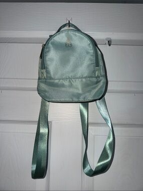 Biossance Mint Green Satin Mini Backpack with Gold Logo